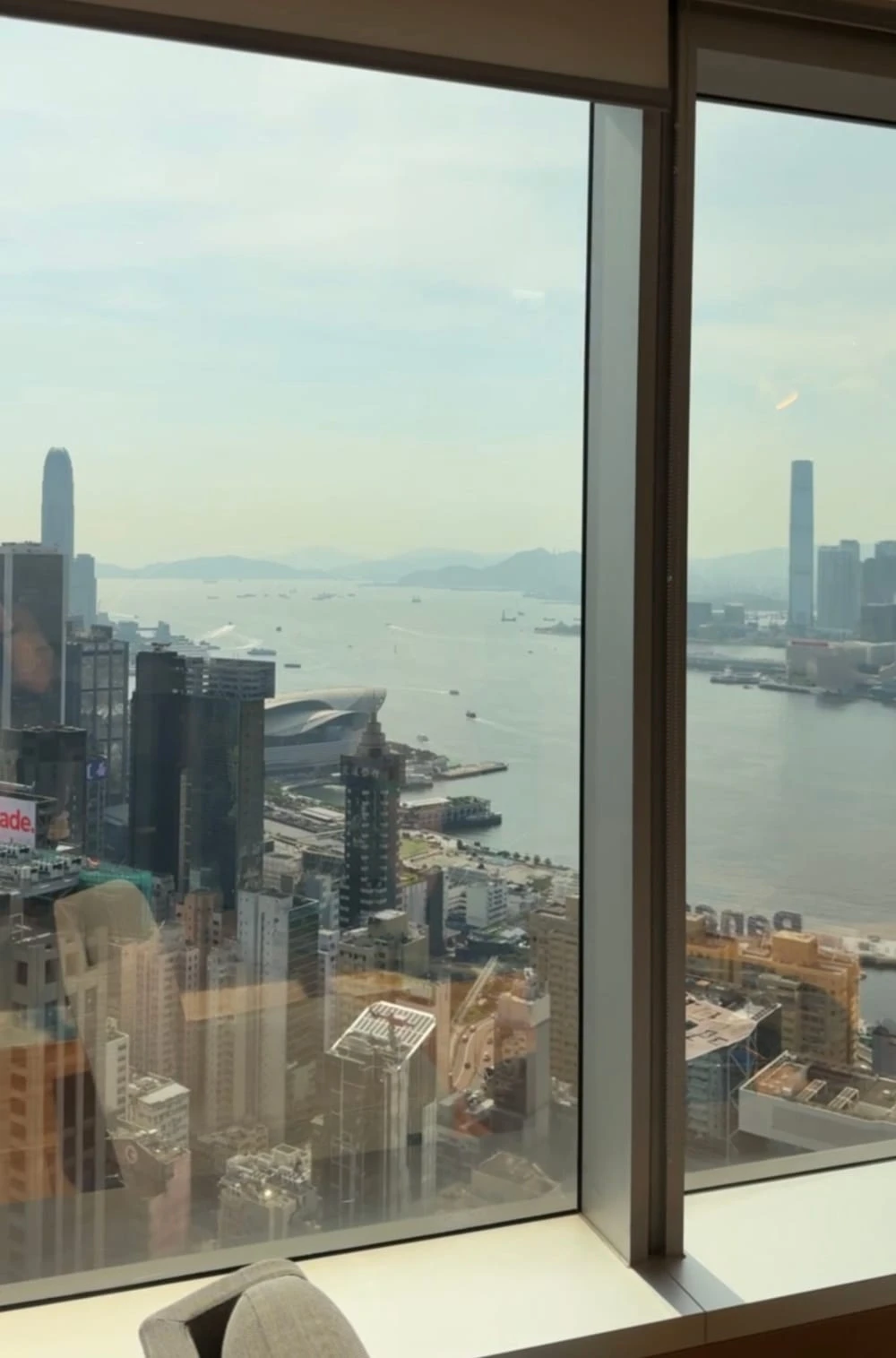 The view of Victoria Harbour and Kowloon from a window at the Lee Garden Wealth Management Centre
